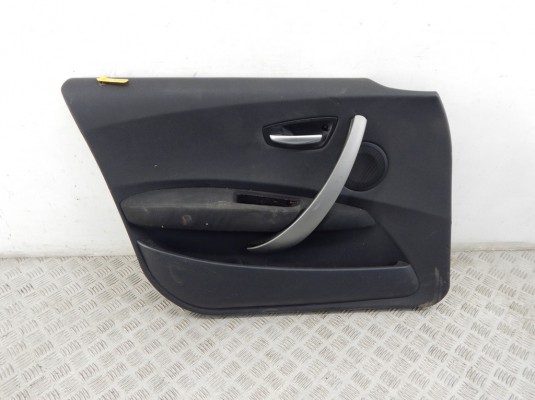 Обшивка двери передней левой (дверная карта) BMW 1-series (E87)